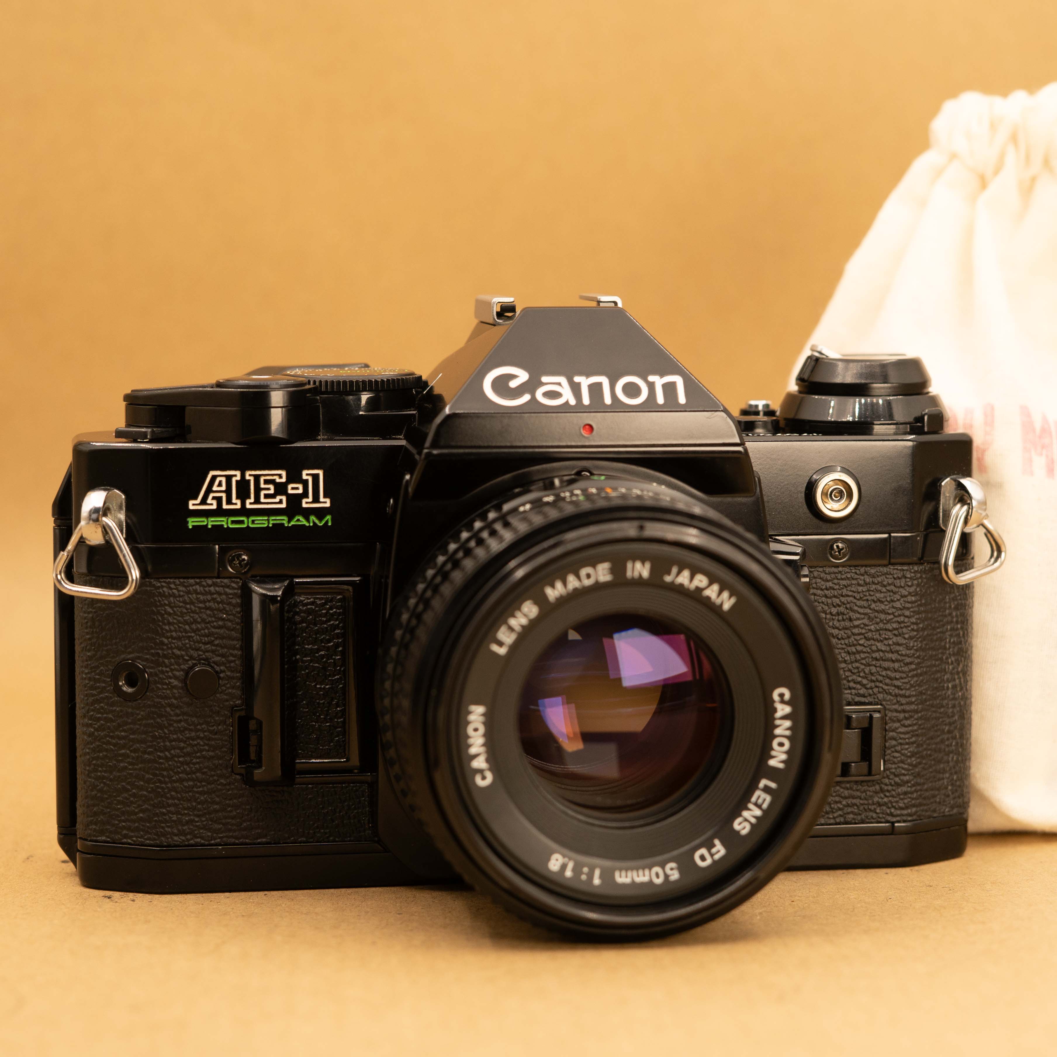 Black Canon AE-1 Program with 50mm f/1.8 Lens 35mm Film Camera