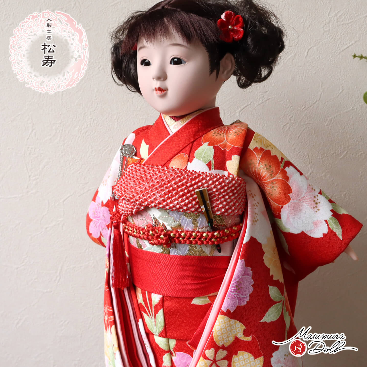 市松人形 黒と金の着物