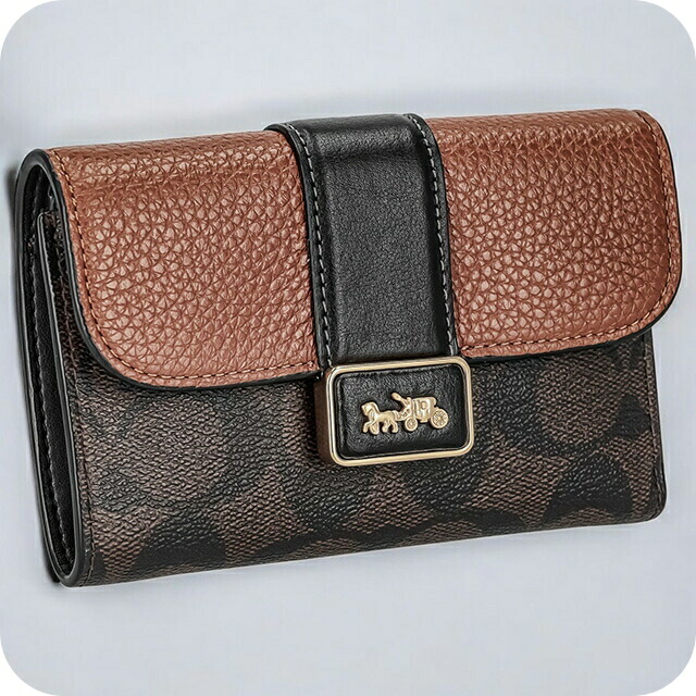 COACH コーチ 二つ折り財布 エンボス シグネチャー ピンク