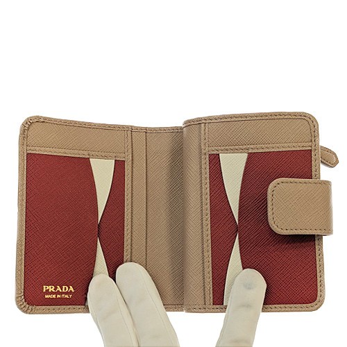 楽天市場】【5%OFF！】 PRADA プラダ 二つ折りウォレット 1ML018