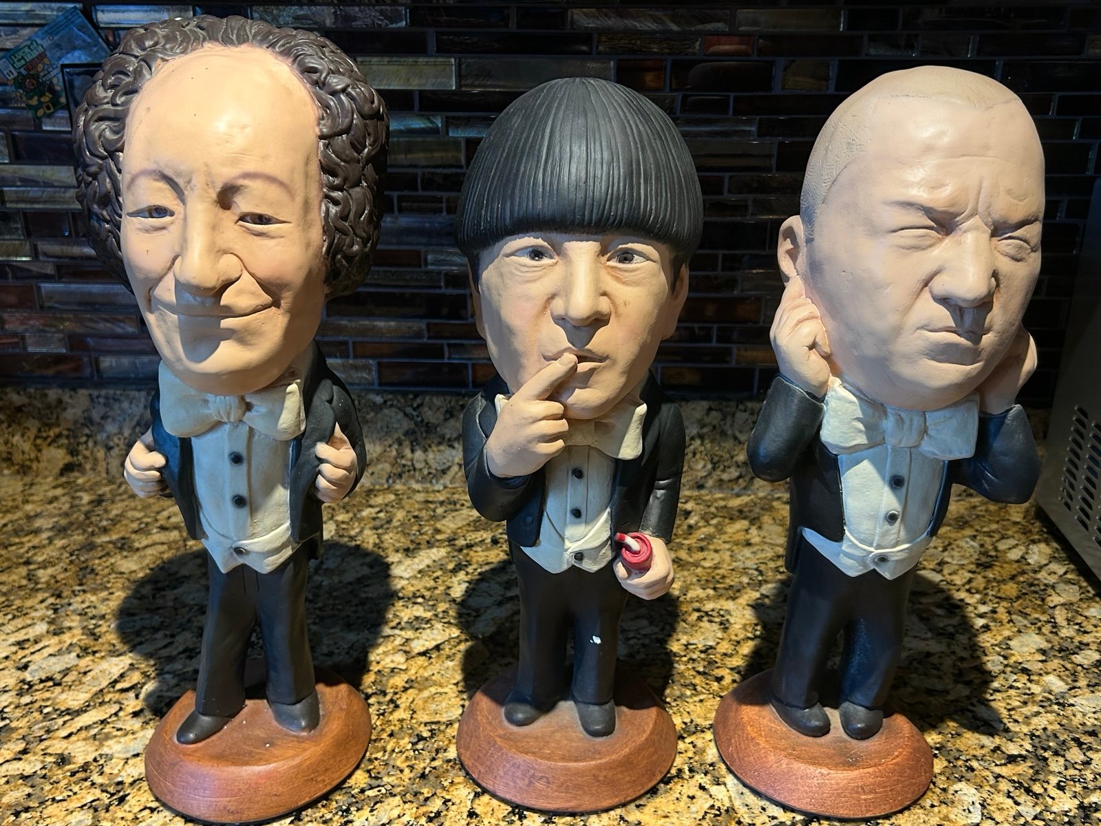 Vintage three stooges chalk statues