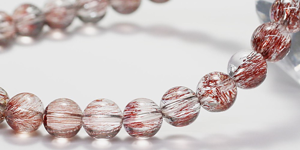 高品質++]スーパーセブンブレスレット/レッド系（約7mm玉・レピドクロ