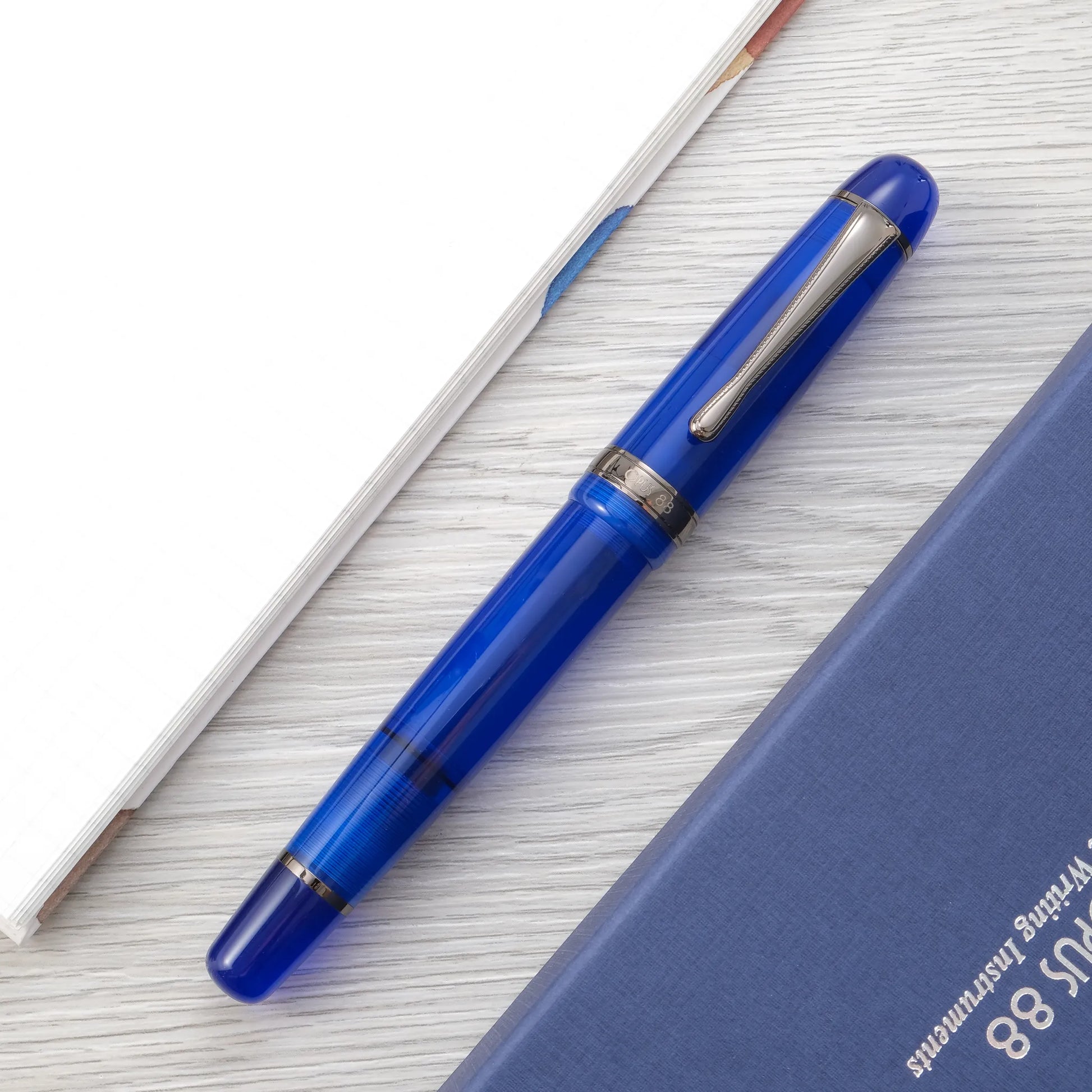 Opus 88 Jazz Eyedropper Fountain Pen - Transparent Blue – Muze Pens