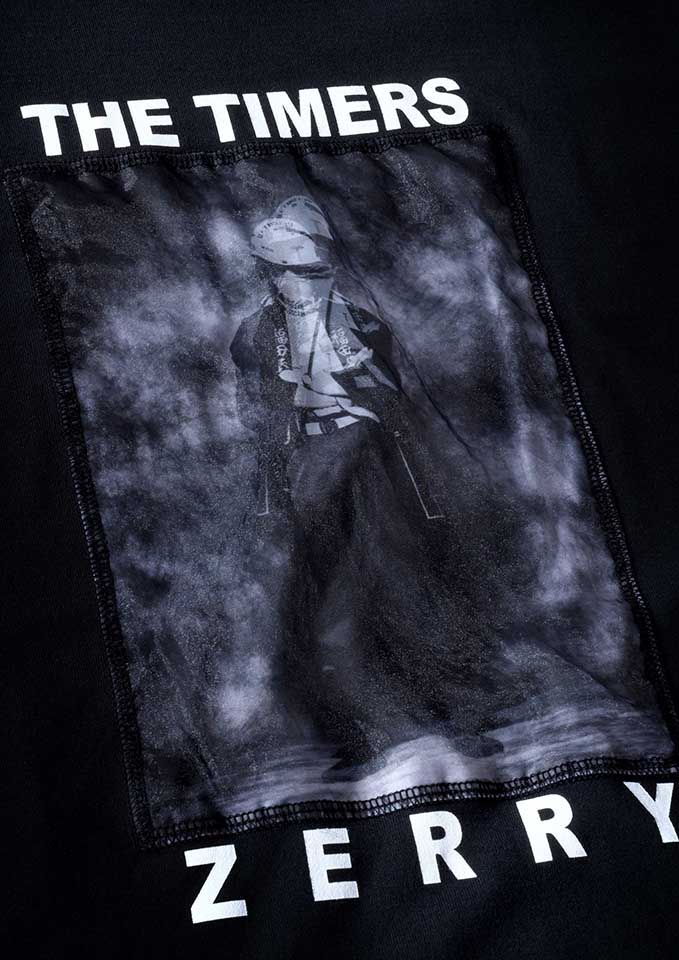 THE TIMERS 35周年を記念してTシャツが登場！ 背面には「争いの河」の