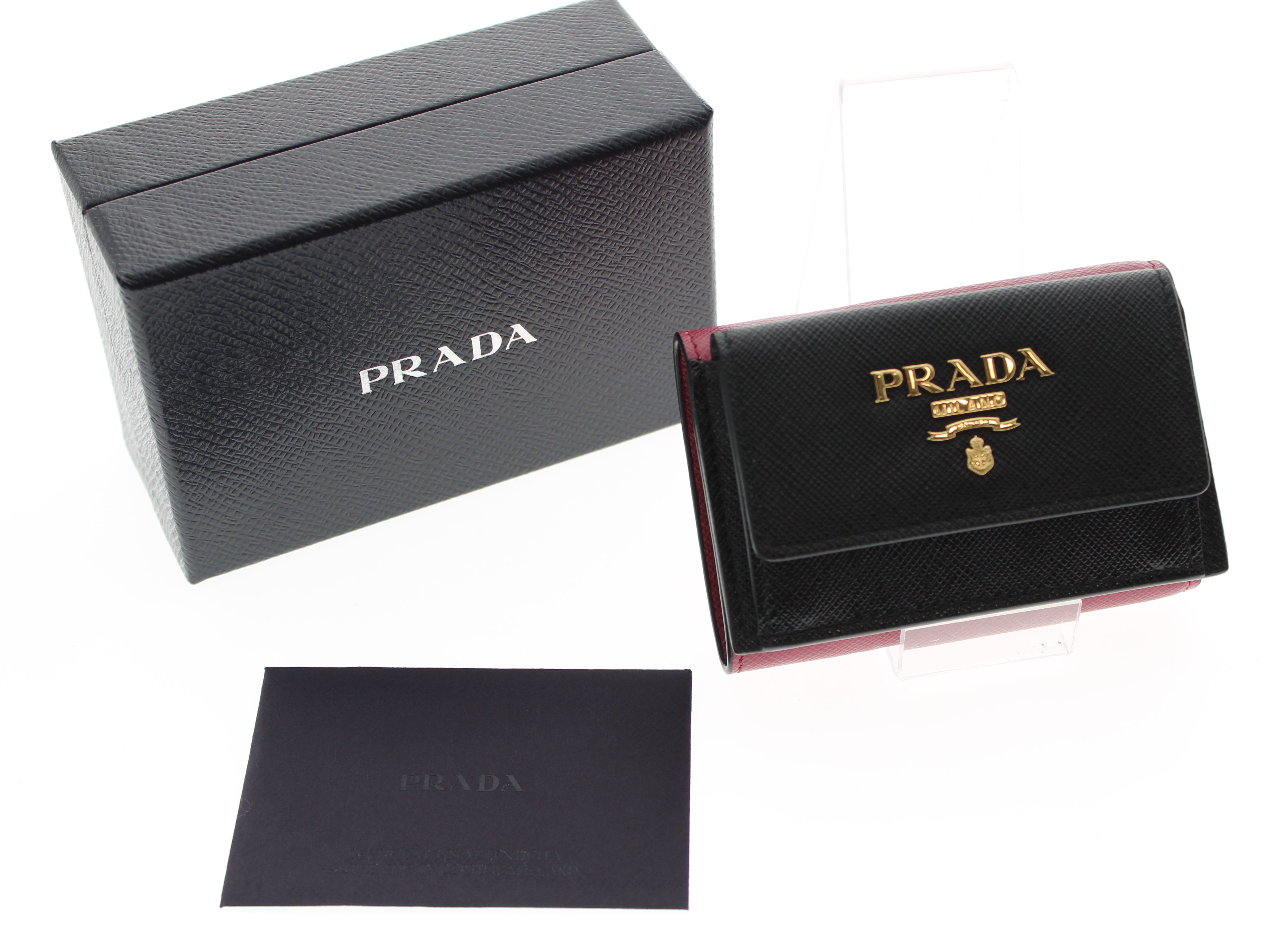 PRADA プラダ 二つ折り財布 黒 ブラックピンク サファイアーノ 箱付き