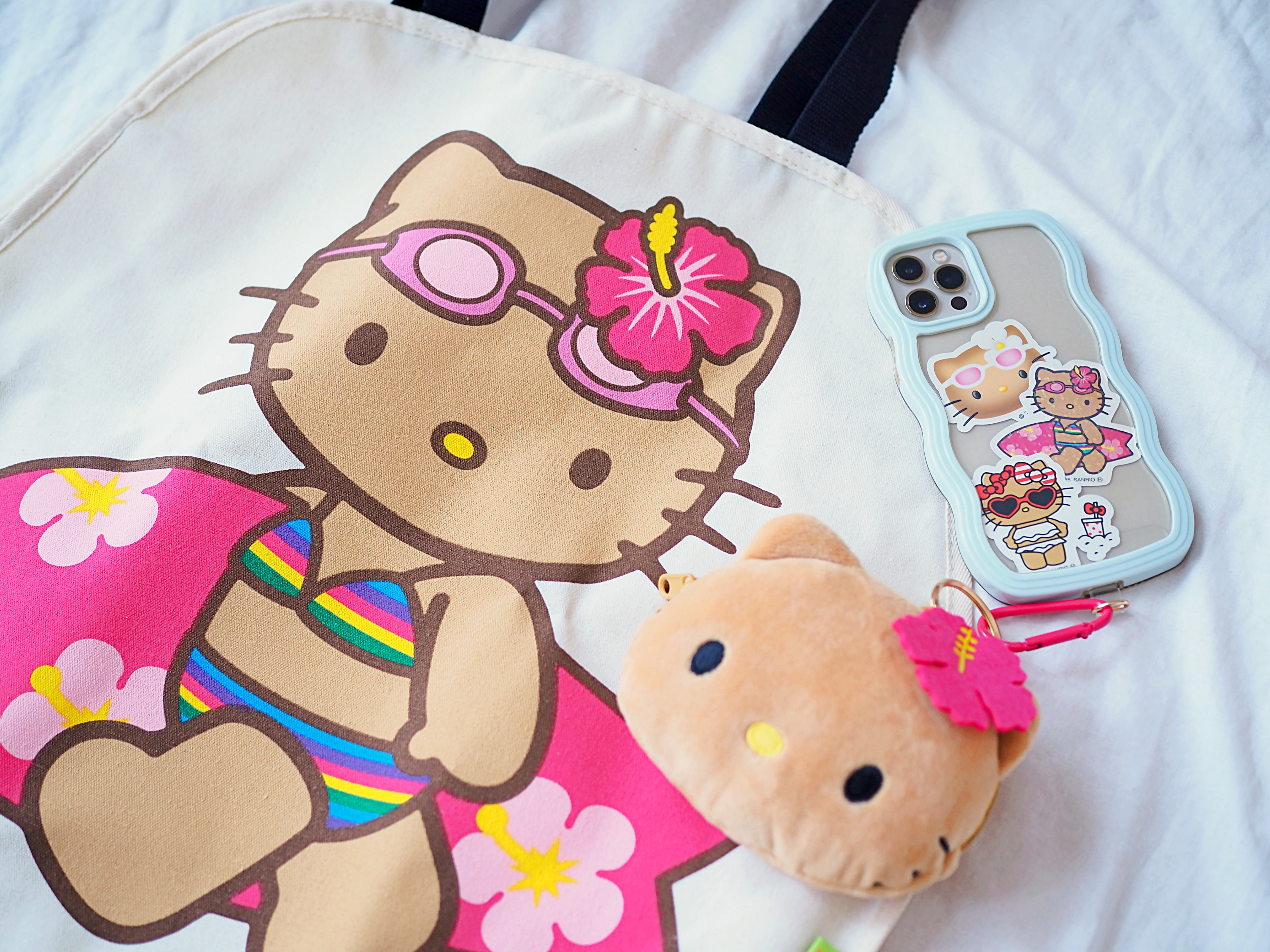 DFS限定・日焼けkitty】アロハコレクション×ハローキティ ポーチ