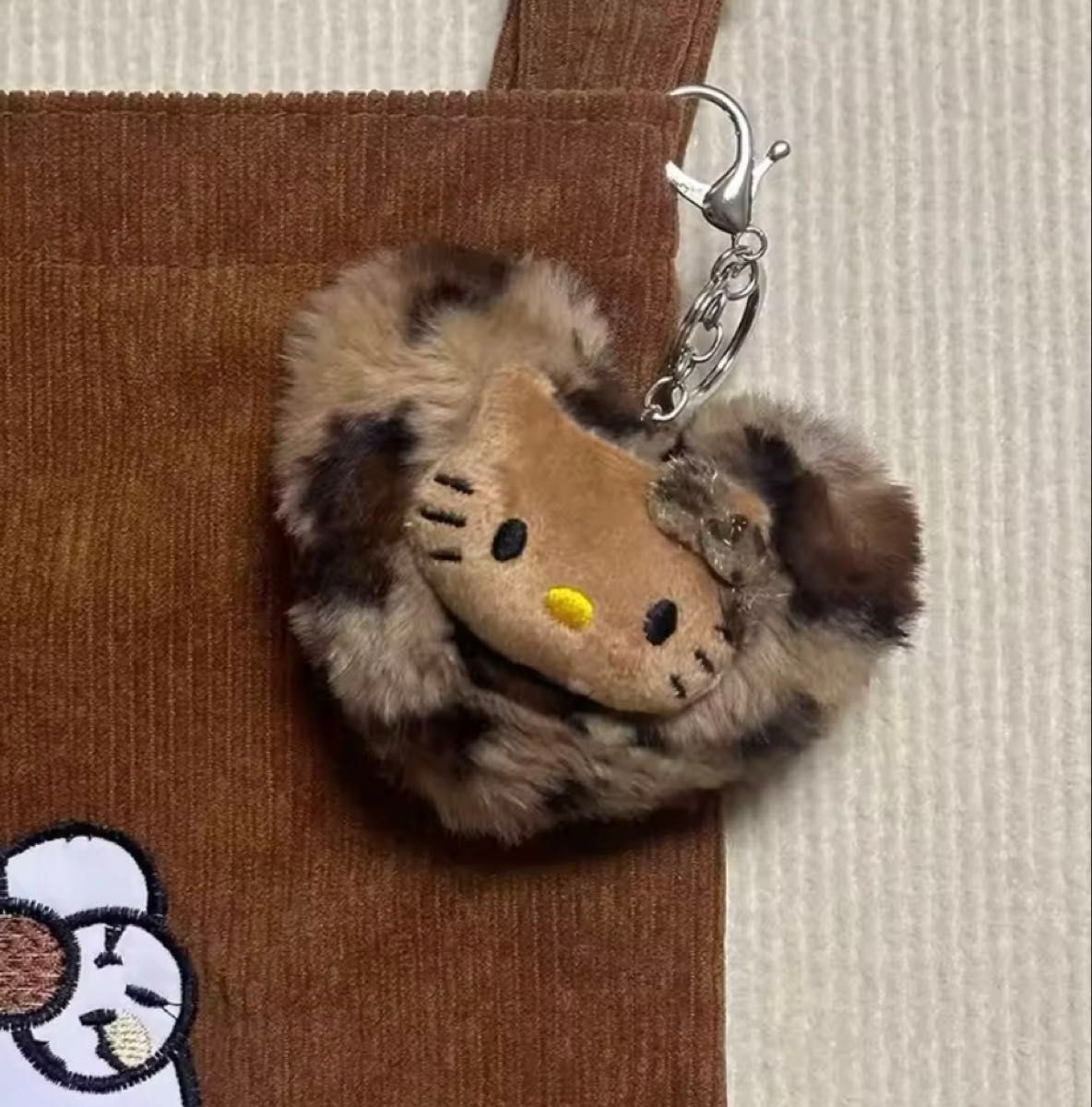 新品】激レア ハローキティ 日焼け ヒョウ柄 ドリンクホルダー レトロ