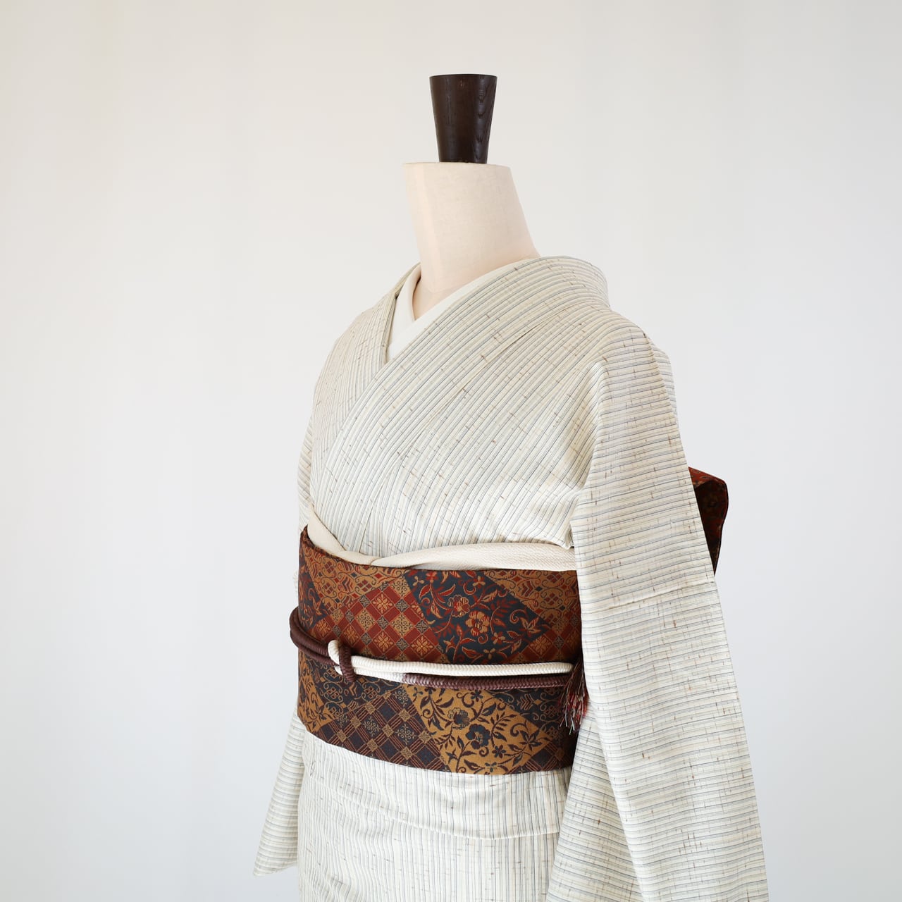 ぜんまい紬（単衣）／ゆったりサイズ・証紙あり・手縫い仕立て