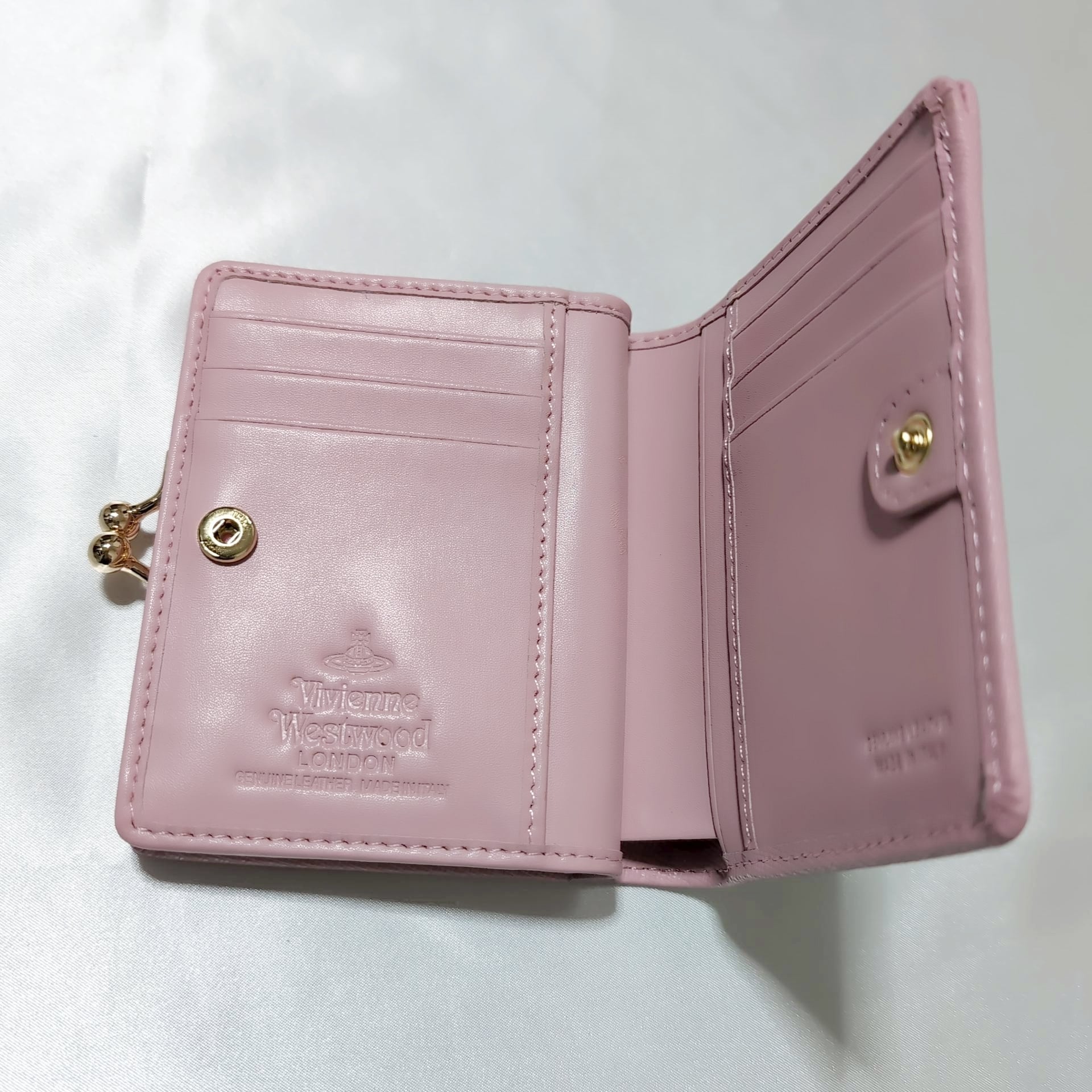 ヴィヴィアンウエストウッド がま口二つ折り財布 ピンク | francore