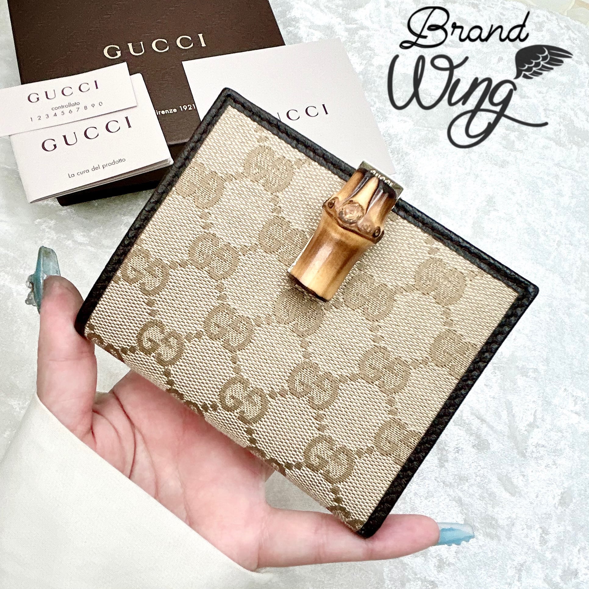 GUCCI GGキャンバス 三つ折り財布 【公式通販】