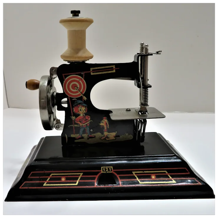 Post WWII British Zone Casige Tin Sewing Machine Model 121. For