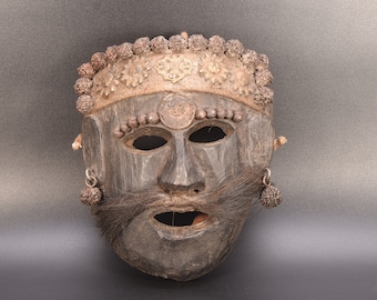 タルー族のシャーマンの悪魔払いのマスク、手彫りのネパールの儀式用