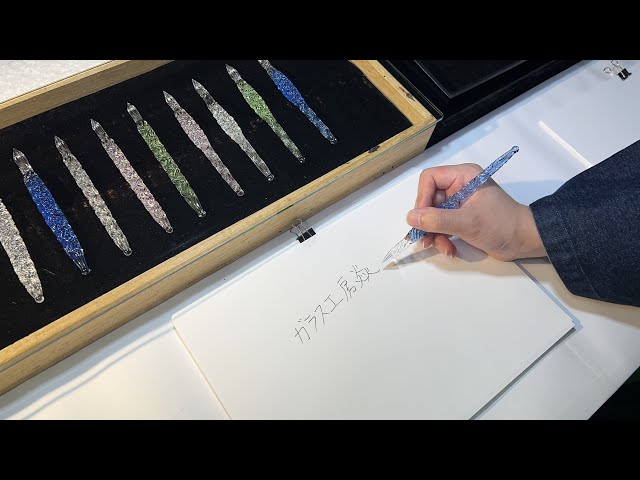 The process of making a glass pen. The world's first hard glass