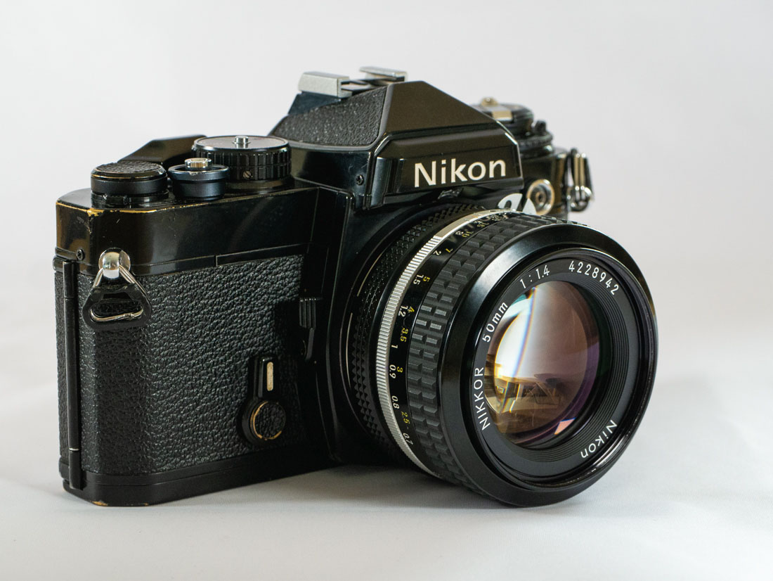 Nikon #17461 Nikon ニコン FE 黒 + NIKKOR 50mm F1.4 フィルムカメラ