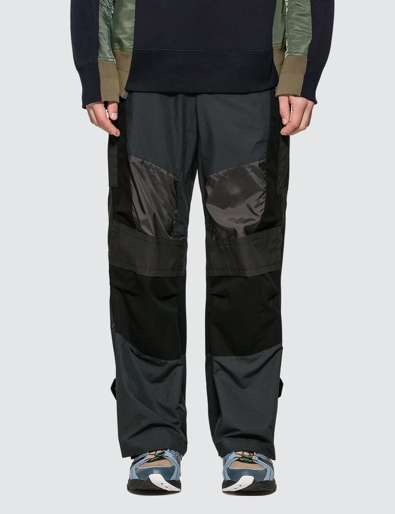 Sacai - Fabric Combo Pants | HBX