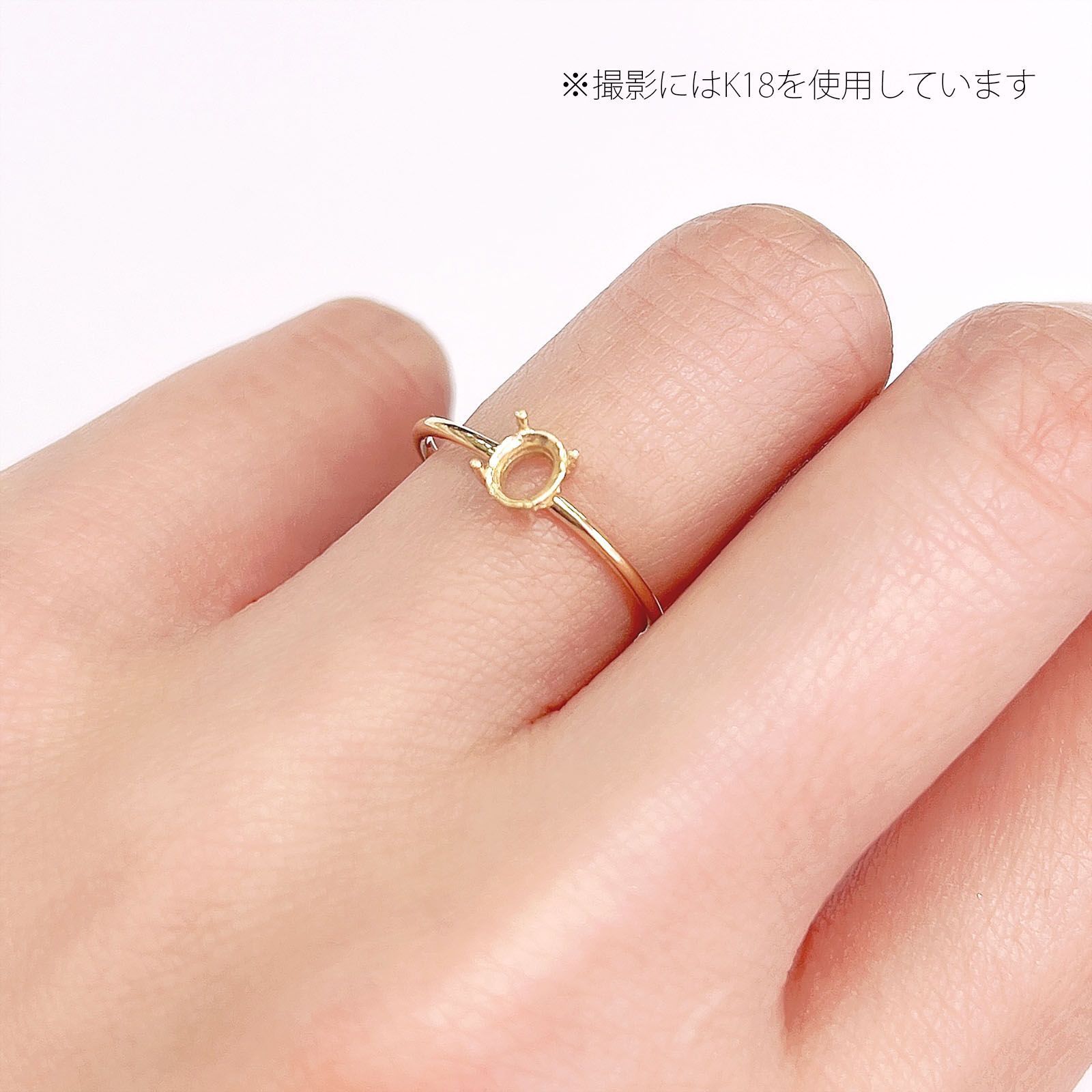 定価￥39,200】K18ガーネットのオーバルカット爪留めリング 11号