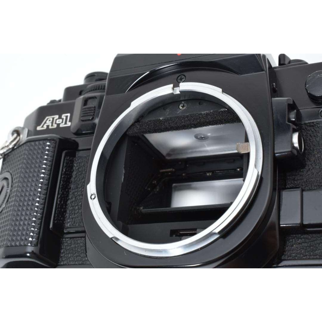 超美品 CANON キャノン A-1 フィルムカメラ モルト新品交換済 M607