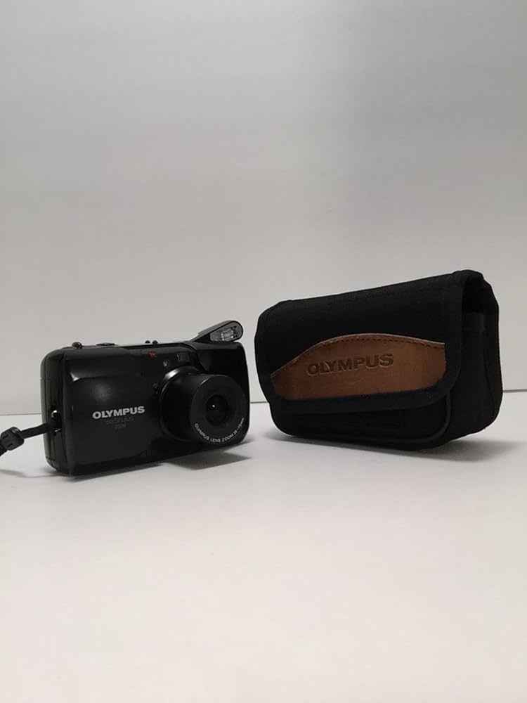 Olympus Infinity Stylus Zoom 35-70mm DLX 35mm Film Camera Outfit