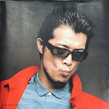 Amazon.co.jp: 矢沢永吉写真集 (1979年) : Japanese Books