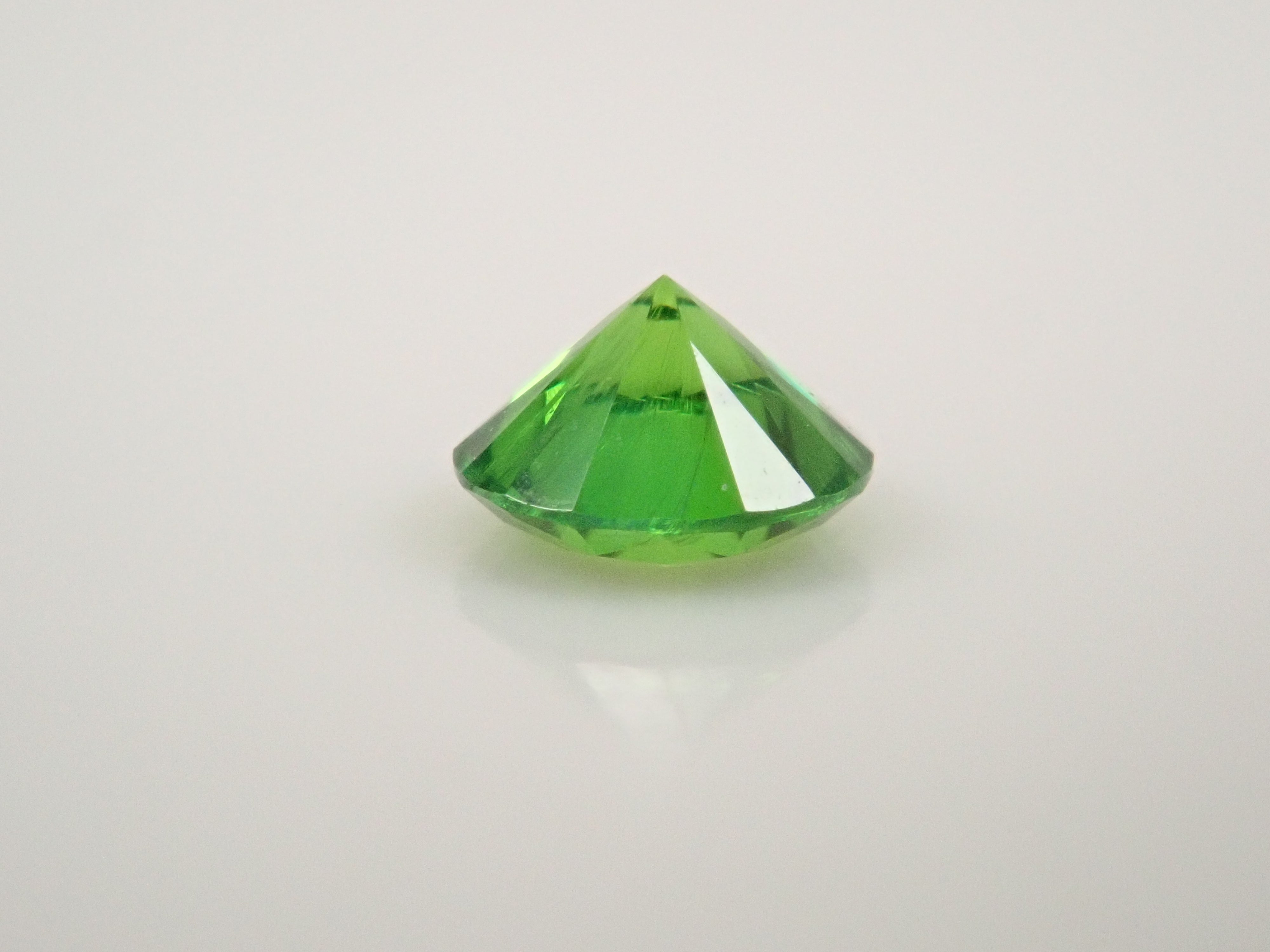 ロシア産デマントイドガーネット（ホーステール認む） 0.128ctルース