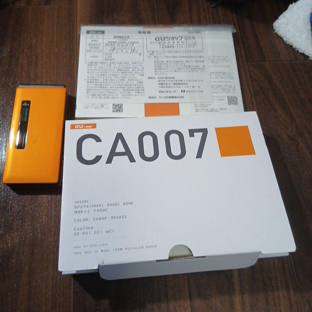 未使用オレンジ CA007 携帯電話本体 未使用オレンジ CA007 携帯電話