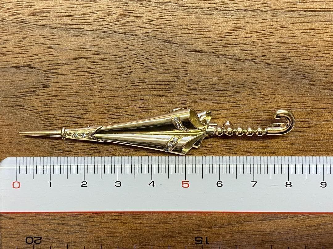 K18 ダイヤモンドブローチ　D0.08ct　6.7ｇ　傘モチーフ　アンブレラ