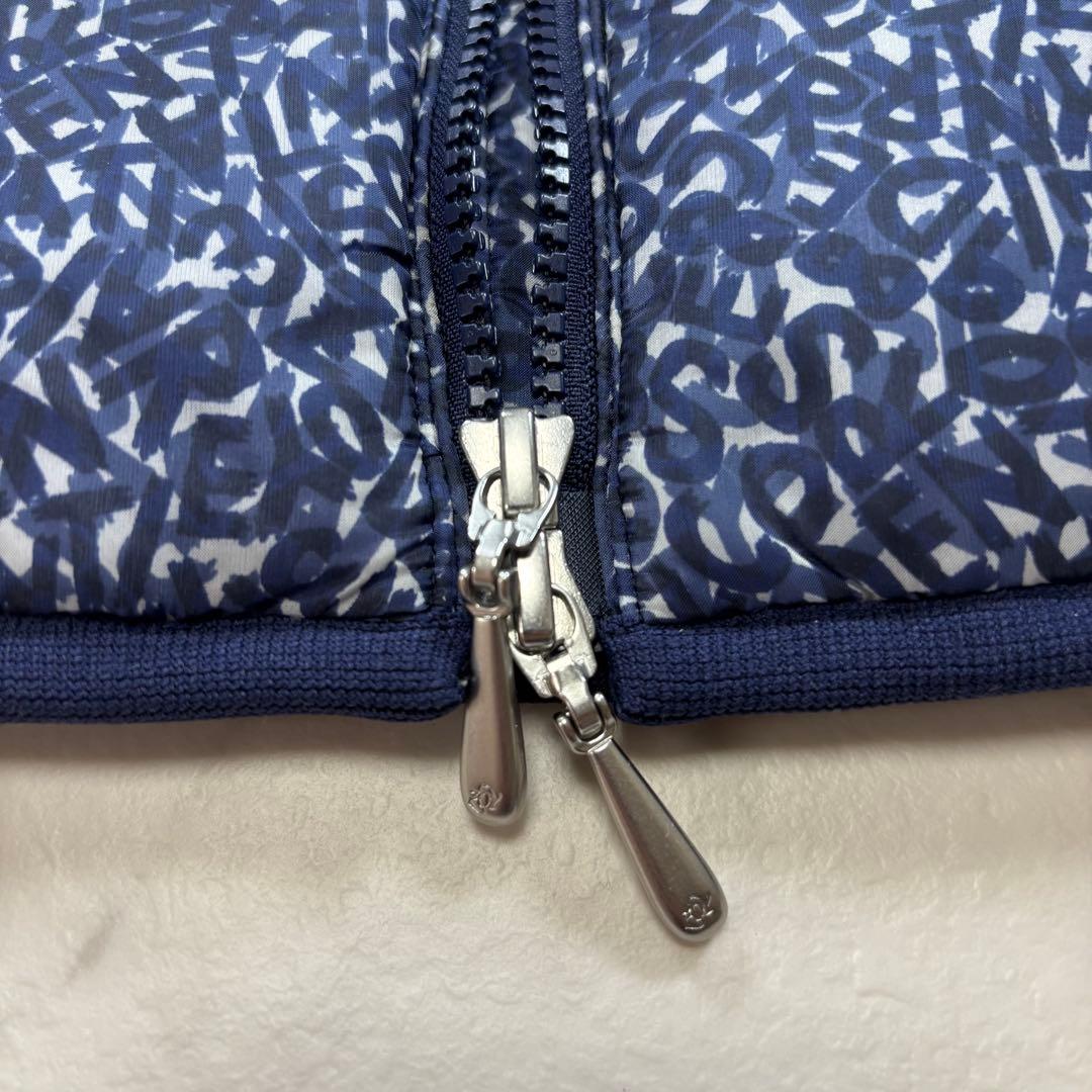 【美品】ZOY ゾーイ 中綿ジャケット ゴルフウェア 総柄 ロゴ 青 38