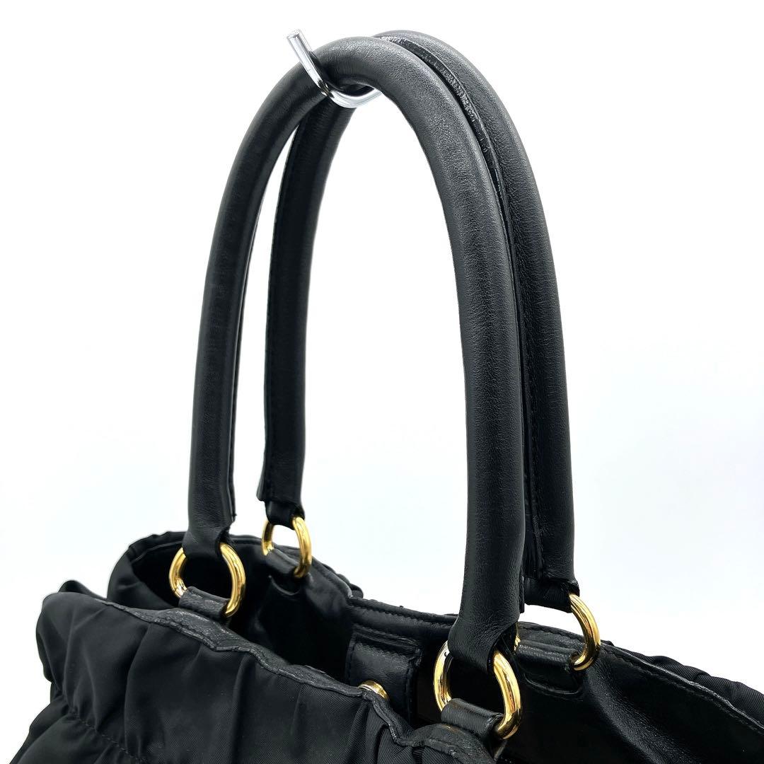 【PRADA】ハンドバッグ　リボン　ロゴ金具　ゴールド金具　ナイロン　ブラック