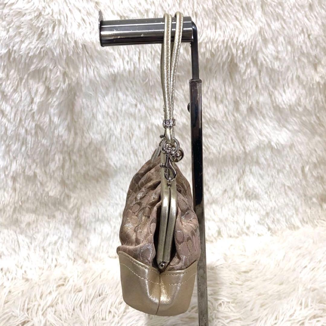 コーチ レザー ミニ ハンドバッグ シグネチャー キャンバス ガマ口