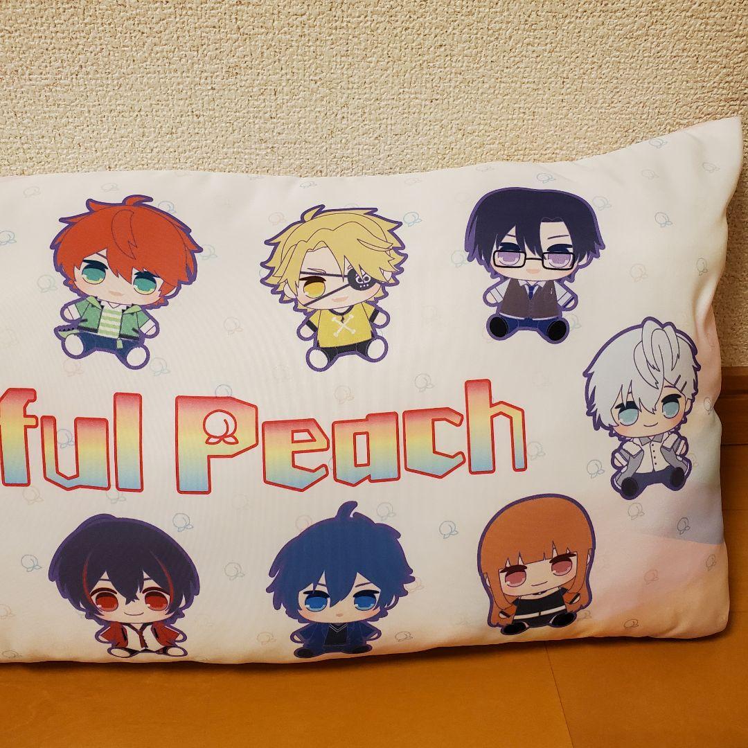 カラフルピーチ きゅるまるイラストロングクッション - メルカリ