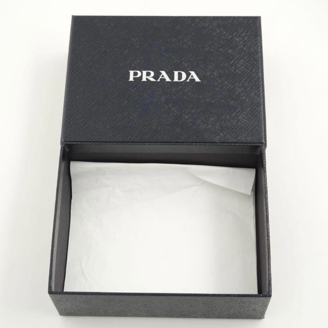 ✨新品未使用・箱保証書付✨　PRADA ミニ財布　シボ革　L字ファスナー ダイノ