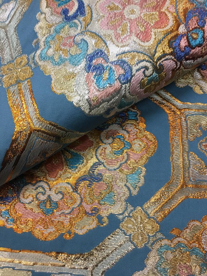 西陣織 手織り彩り蜀甲華紋 水色 六通柄袋帯