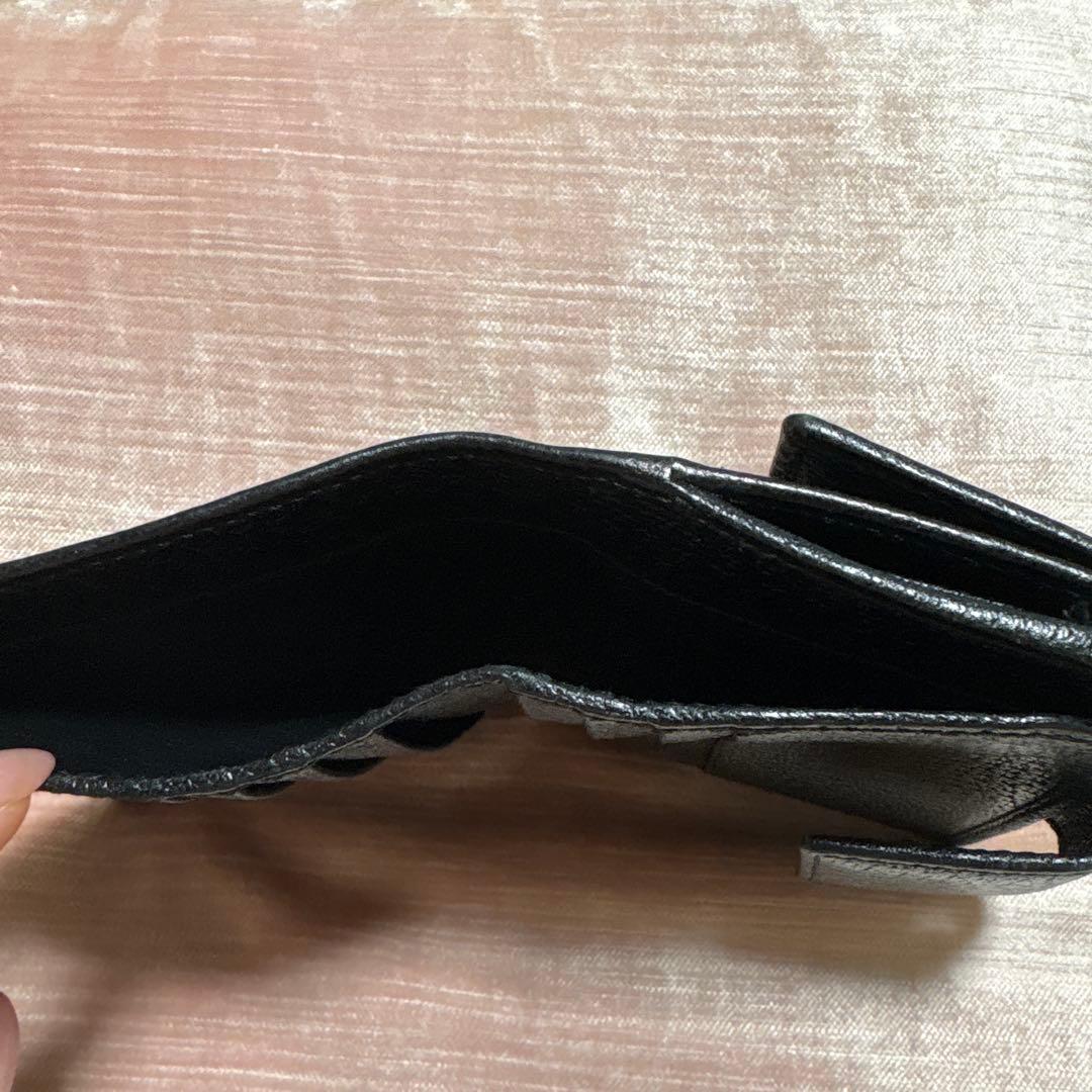 GUCCI レザー 折り財布 筆記体 ロゴ 型押し 黒