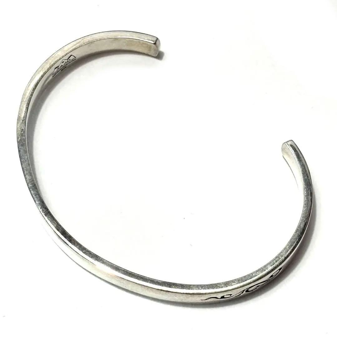 新品未使用 サード シルバーアクセサリー 外アラベスク 内側サンシンボルバングル