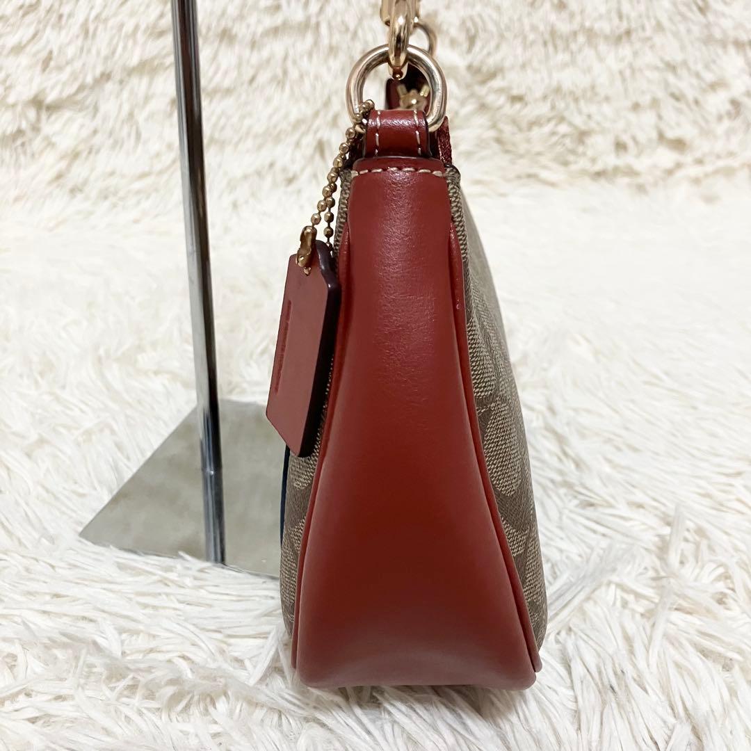 【美品】COACH＊ハンド 2way アクセサリーポーチ PEANUTSコラボ