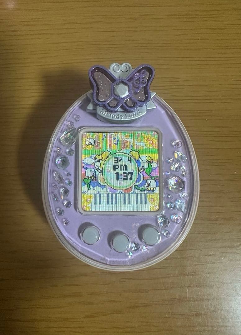 たまごっちピース Tamagotchi P's パープル たまデコピアス付き - メルカリ