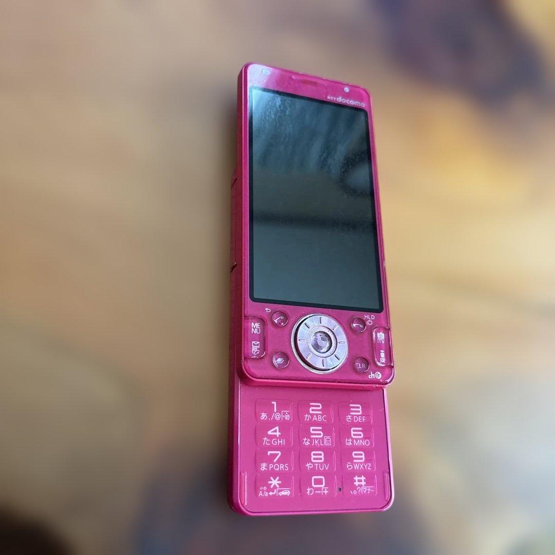 NTT docomo ピンク スライド式携帯電話 ジャンク品 - メルカリ