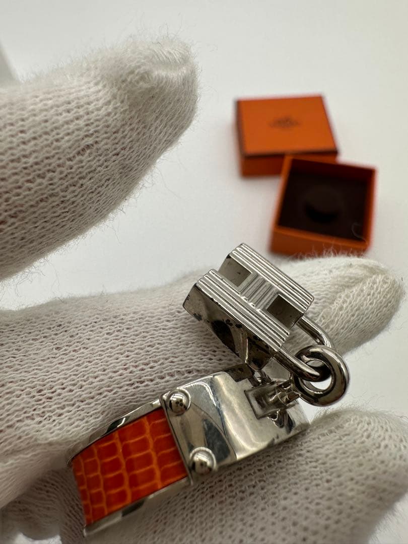 処分値下げ　HERMES オレンジ ロック付きリング