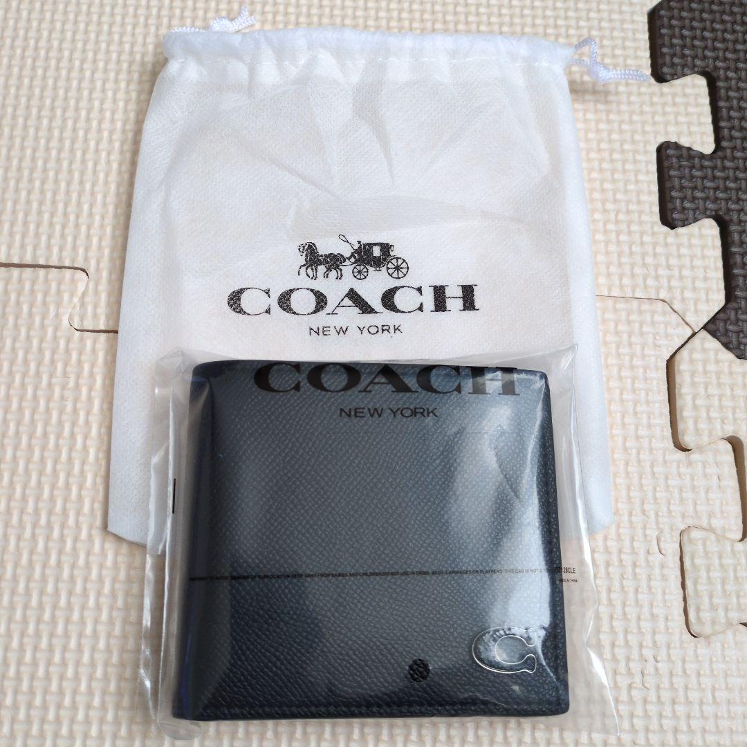新品未使用COACH 二つ折り財布　レディース メンズ シンプル ブラック