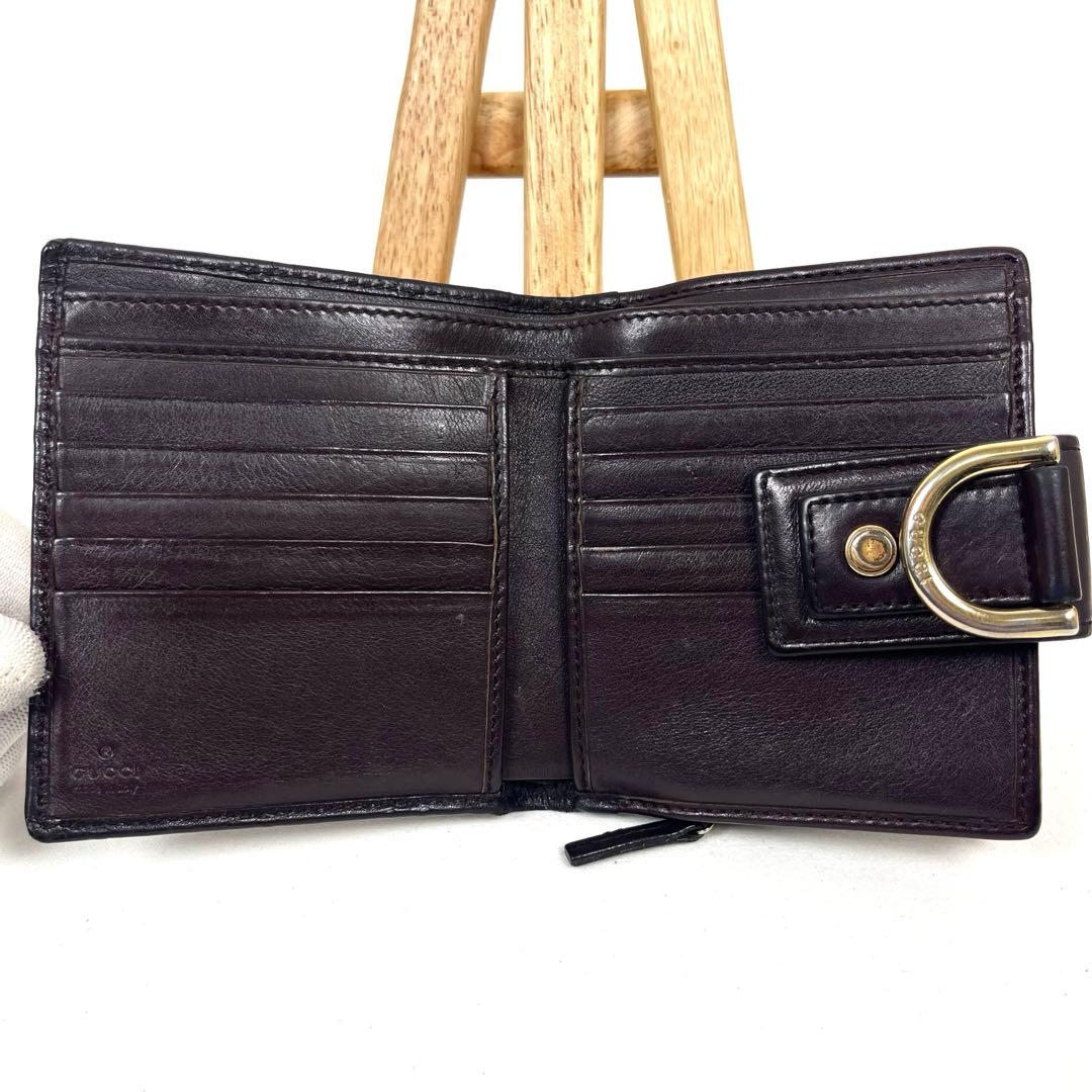 グッチ 二つ折り財布 アビー シマレザー ラウンドファスナー ロゴ エンボス