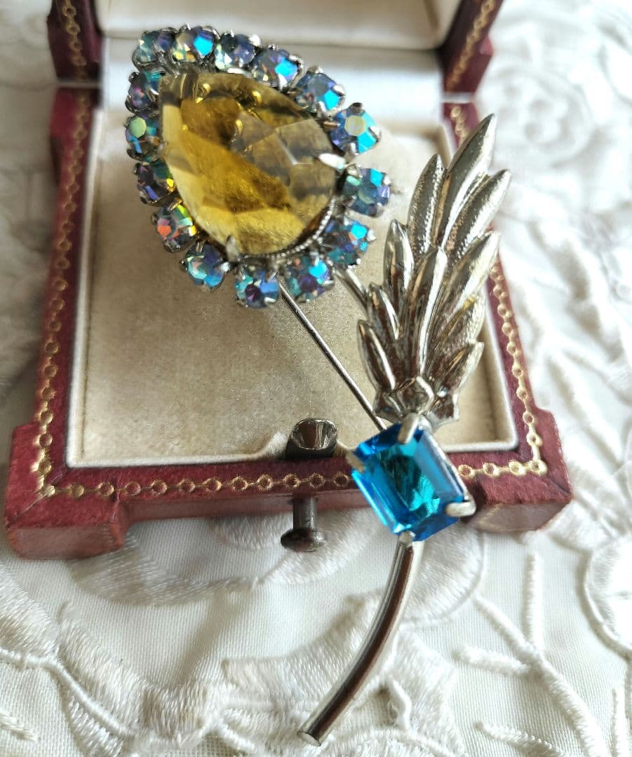 アンバーカラー雫型フラワー ブローチ 虹色 ネオンブルー ビジュー