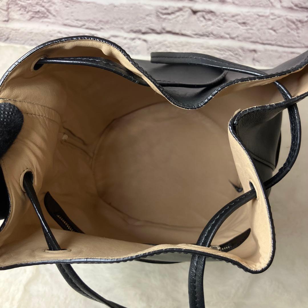 J&M Davidson✨デイジー ウィズ スタッズ 巾着 黒 バンドバッグ