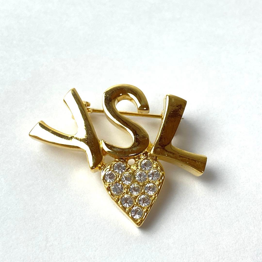 イヴサンローラン YSLロゴ ラインストーンブローチ カサンドラ