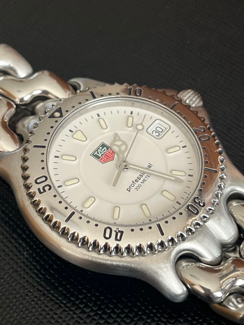 タグホイヤー セルWG1112-KO QZ ホワイト メンズ腕時計 中古美品