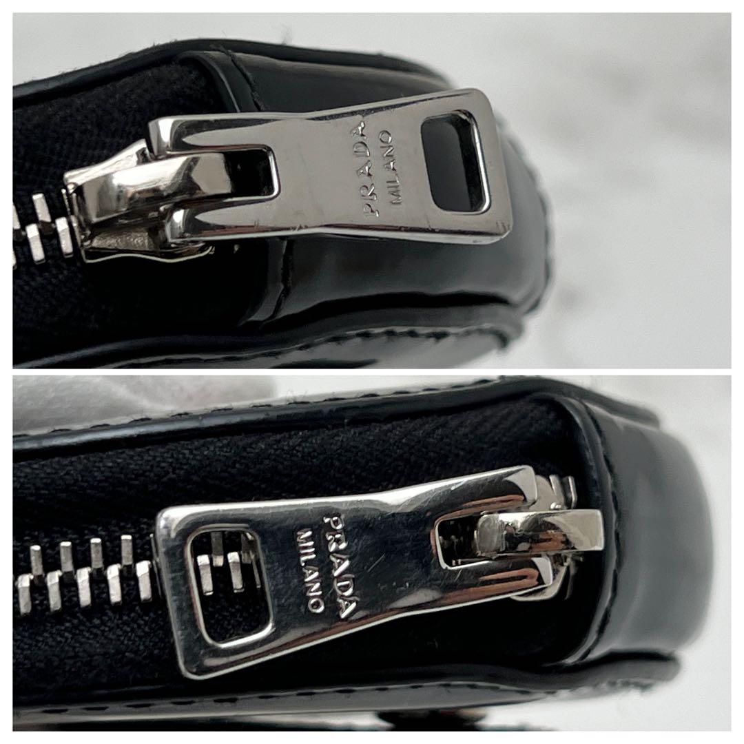 プラダ ブラッシュドレザー ラウンド ミニポーチ ケース ブラック