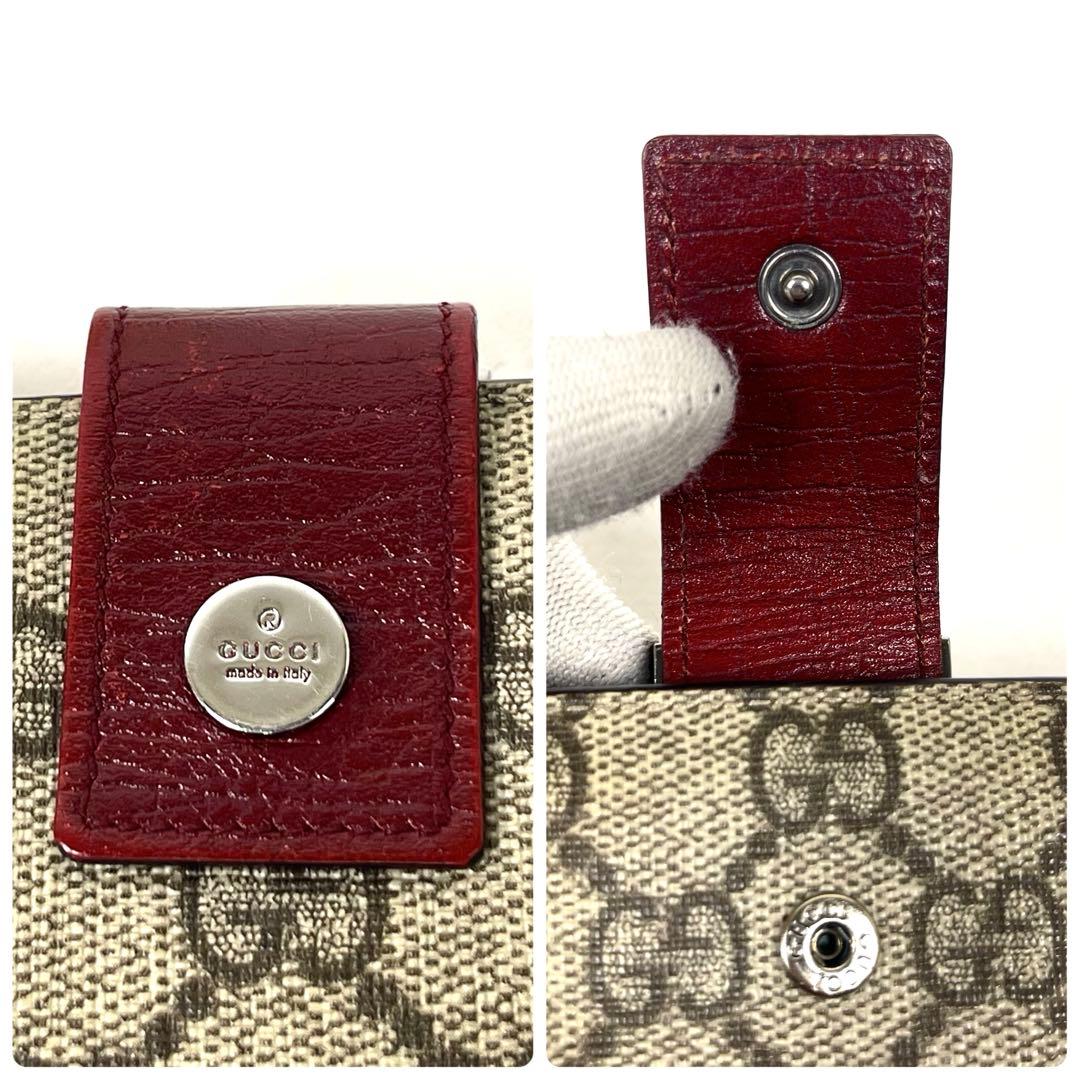 グッチ　折り財布　GGスプリーム　ロゴ総柄　がま口　ミディアム　PVC レザー