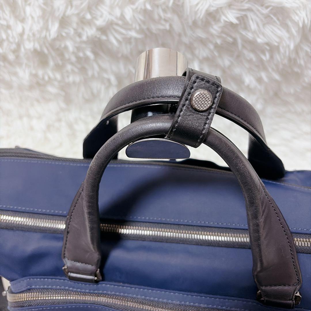 TUMIビジネスバックHarrisonサニーコンバーチブル・ブリーフ