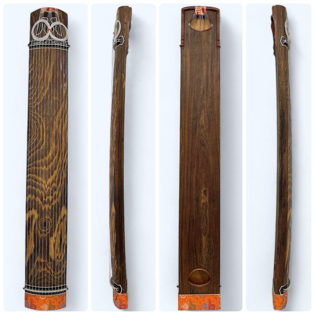 琴上角巻のすだれ彫