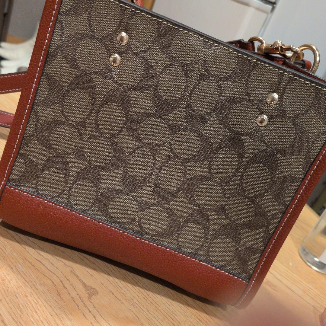 【美品】コーチスヌーピコラボデンプシートート22・シグネチャー キャンバスバッグ