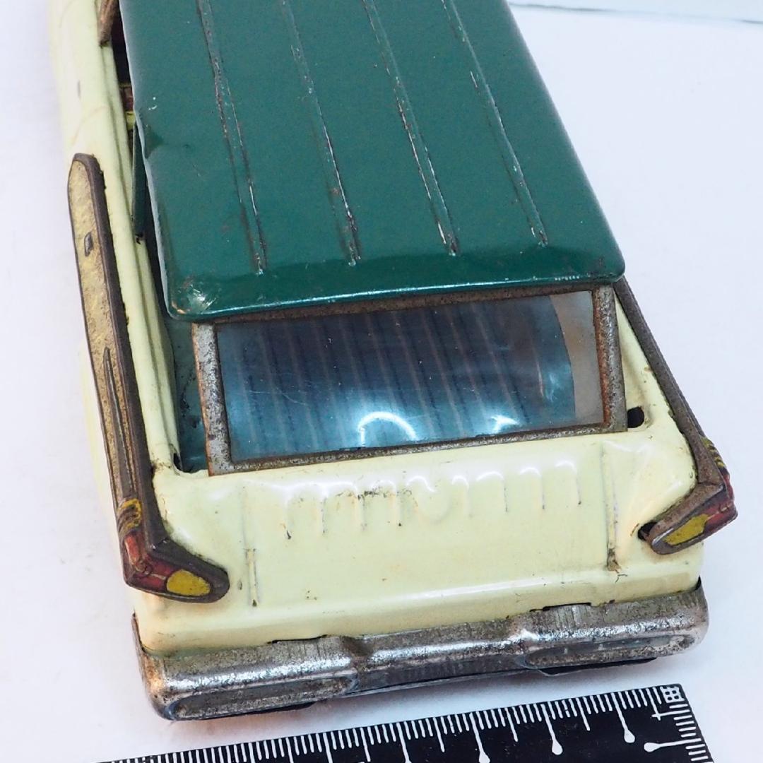 萬代屋  マーキュリー ワゴン白アイボリー右後輪欠tinブリキtoy car箱無